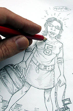 Fotografía de una mano realizando una ilustración a lápiz