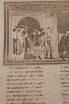 Texto medieval iluminado.